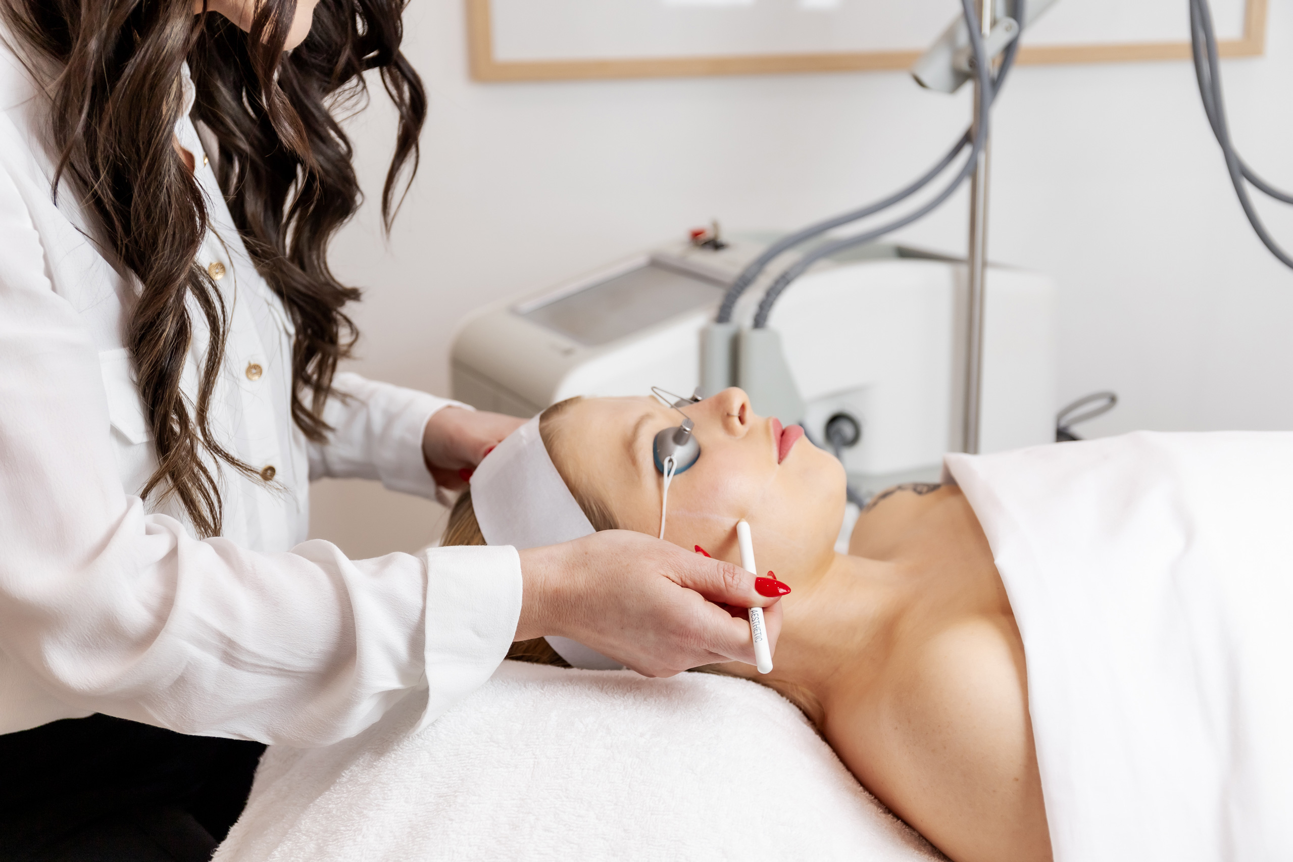 WOMAN RECEIVING A PROFESSIONAL LASER SKIN TREATMENT AT MY SKIN & BODY CLINIC